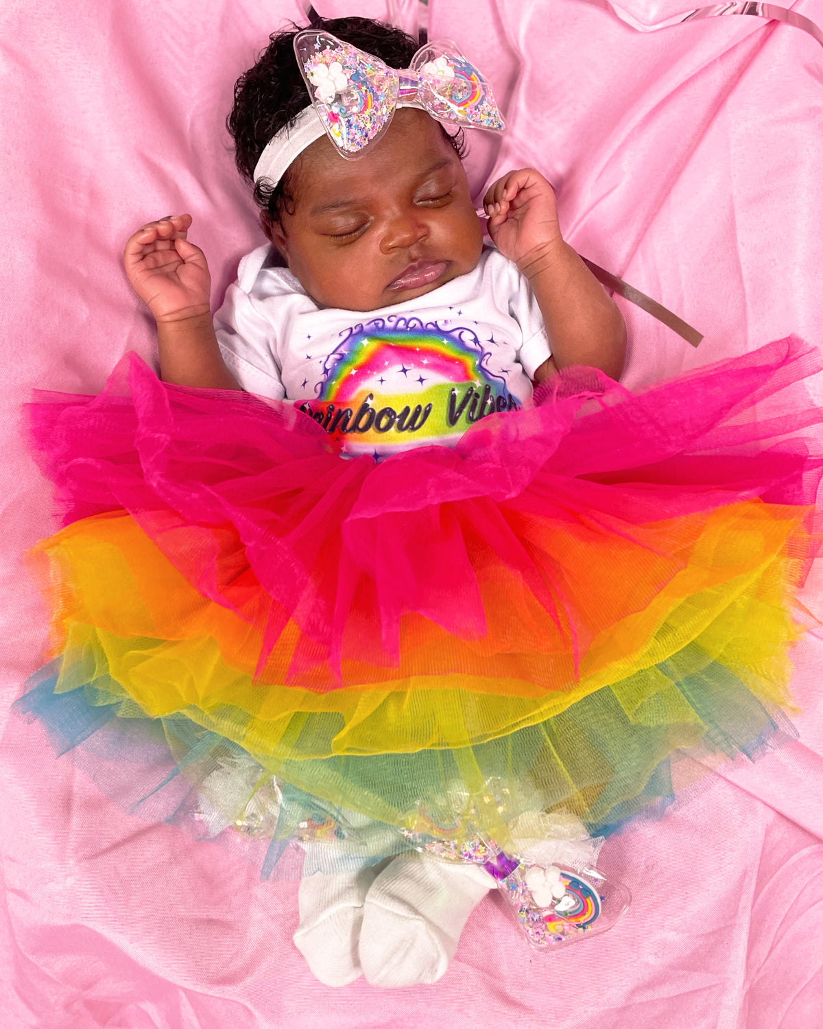 RAINBOW VIBES ONESIE